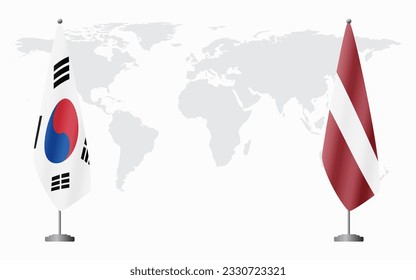 South Korea and Latvia flags for official meeting against background of world map.