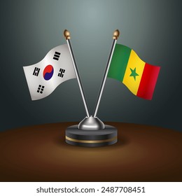 Banderas de tabla de Corea del Sur y Senegal en relación con el fondo de gradiente. Ilustración vectorial