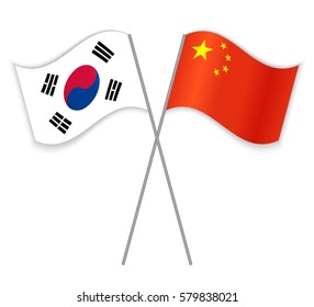 South Korean and Chinese crossed flags. South Korea combined with China isolated on white. Language learning, international business or travel concept.
