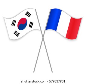 South Korean and French crossed flags. South Korea combined with France isolated on white. Language learning, international business or travel concept.