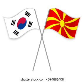 South Korean and Macedonian crossed flags. South Korea combined with Macedonia isolated on white. Language learning, international business or travel concept.