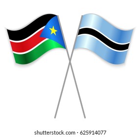 South Sudanese and Motswana crossed flags. South Sudan combined with Botswana isolated on white. Language learning, international business or travel concept.