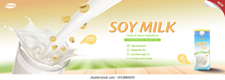 Soy milk pouring down into glass with milk carton and soy beans on wooden table, landscape background