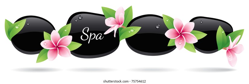 Spa background of black pebbles decorated with flowers