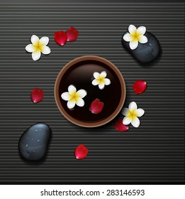 spa background with tropical flowers and stone spa