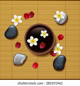 spa background with tropical flowers and stone spa