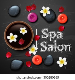 spa background with tropical flowers and stone spa candle