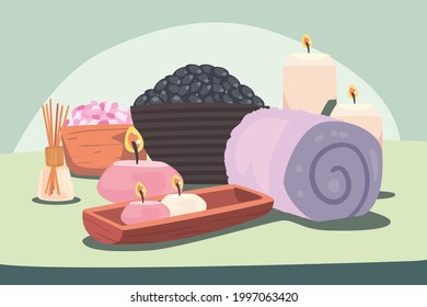 Spa center candles stones and towel