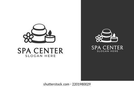 Spa center logo design. Stone, flower, and candle icon for therapy and relax symbol