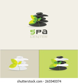spa center logo element made of stacked black and white zen stones and green leaves- japanese rock garden stylized vector illustration