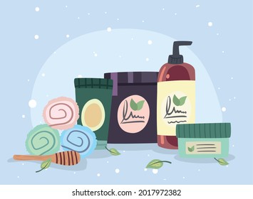 Spa center towels honey stick and jars with leaves