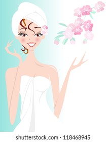 Spa Girl AÂ?Â? Pretty Girl In Towel A Woman Relaxing With A Towel Wrap And Blossom In Her Hair. Blossom And Bamboo