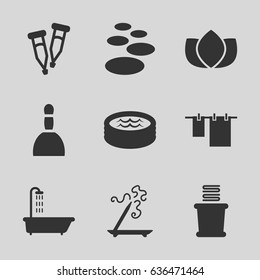Spa icons set. set of 9 spa filled icons such as shower, lotus, aroma stick, cloth hanging, towels, pipette