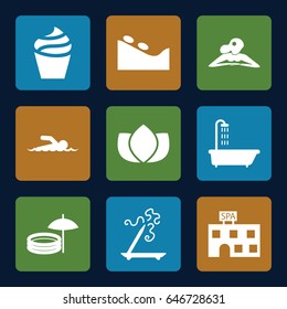 Spa icons set. set of 9 spa filled icons such as shower, cream, lotus, aroma stick, swimmer