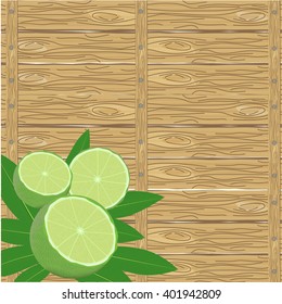 spa leaves and lime in a corner on wood surface background 