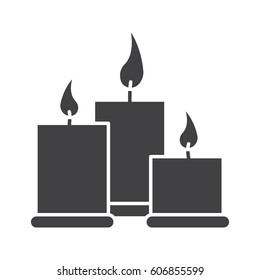 Spa salon candles glyph icon. Silhouette symbol. Aromatherapy. Negative space. Vector isolated illustration