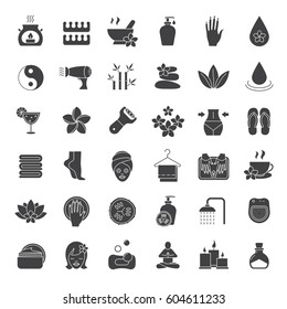 Spa salon glyph icons set. Aromatherapy silhouette symbols. Oil drop, mortar and pestle, foot file, cream, plumeria flower, hairdryer, towels, flip flops, shower, candles. Vector isolated illustration