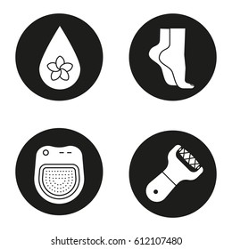 Spa salon icons set. Aromatherapy oil drop, woman's feet, spa salon bath, foot file. Vector white silhouettes illustrations in black circles