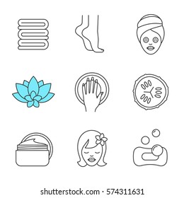 Spa salon procedures linear icons set. Towels, woman's feet and face, cucumber slice, hand with manicure, cream jar, spa flower. Thin line contour symbols. Isolated vector illustrations