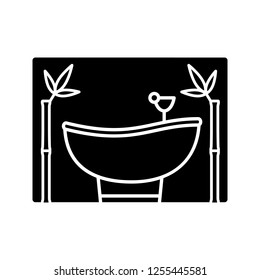 Spa salon services glyph icon. Massage and body care. Wellness and relax. Bathroom. Silhouette symbol. Negative space. Vector isolated illustration
