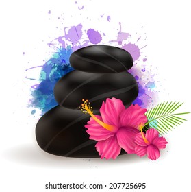 Spa stones with hibiscus flowers on colorful splash