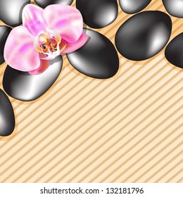 Spa stones and orchid on the background