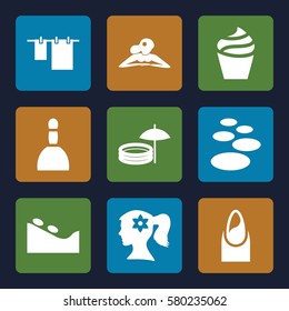 spa vector icons. Set of 9 spa filled icons such as nail, woman face with flower in hair, cream, cloth hanging