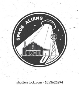 Space Aliens. Humans are not alone. Vector illustration. Concept for shirt, print, stamp, overlay or template. Vintage typography design with ufo flying spaceship and farm silhouette.