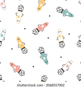 space background illustration with stars and rockets hand drawn seamless vector pattern in cartoon style for kids used for print, wallpaper, decoration, fabric, textile