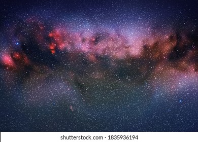 Space background with night starry sky and Milky Way. Red blue nebula