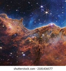 Space background with realistic nebula and shining stars. Colorful cosmos with stardust and milky way. Magic color galaxy. Infinite universe and starry night. Vector illustration.