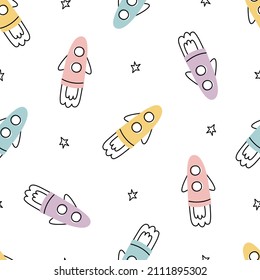 Space background with rockets and stars baby seamless vector pattern in cartoon style for print, wallpaper, decoration, textile
