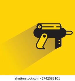 space blaster gun icon with shadow on yellow background