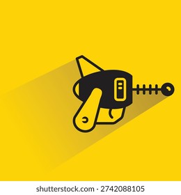 space blaster gun icon with shadow on yellow background