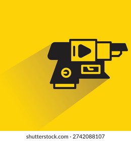 space blaster gun icon with shadow on yellow background