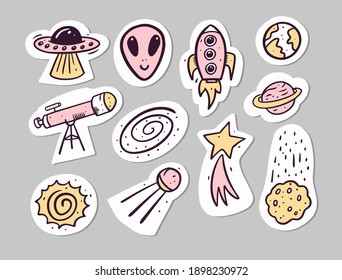 Space and cosmic doodle stickers set. Hand drawn cartoon stickers. Vector illustration. Isolated on grey background.