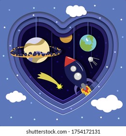 Space cut out of paper with planets, rocket and stars. Heart cut out of paper. Hung on strings paper satellite, Earth, Saturn, mercury, satellite and meteorite. Paper cartoon space with stars and