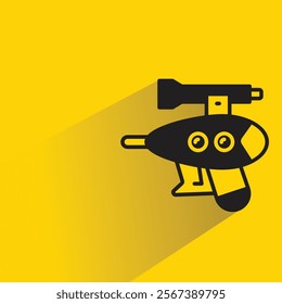 space gun icon with shadow on yellow background