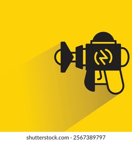 space gun icon with shadow on yellow background
