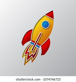 The space rocket icon carved from paper. Vector illustration. Paper art of the colored space rocket, isolated.