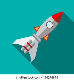 Space rocket icon in flat style on a turquoise background