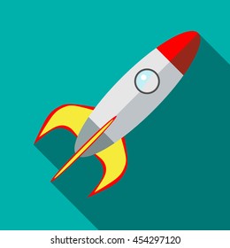 Space rocket icon in flat style on a turquoise background