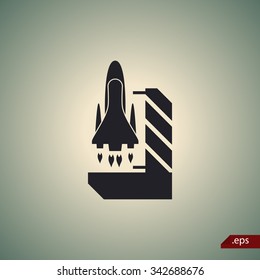 Space shuttle on a take-off area icon