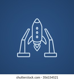 Space shuttle on a take-off area line icon for web, mobile and infographics. Vector light blue icon isolated on blue background.