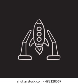 Space shuttle on take-off area vector sketch icon isolated on background. Hand drawn Space shuttle on take-off area icon. Space shuttle on take-off area sketch icon for infographic, website or app.