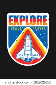 Space Travel  Rocket badge print in bright blue red and yellow colour with multicolour explorer typography on a black base.