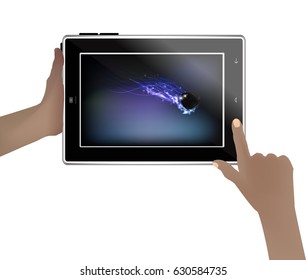Space wallpaper on a tablet in human hands. Illustration for your design. Falling meteor
