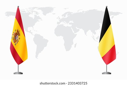 Spain and Belgium flags for official meeting against background of world map.