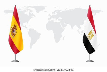 Spain and Egypt flags for official meeting against background of world map.