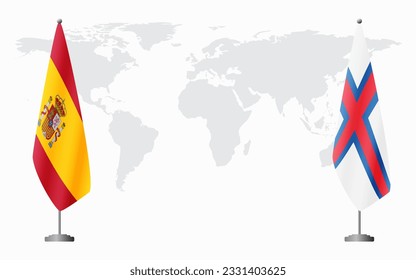 Spain and Faroe Islands flags for official meeting against background of world map.